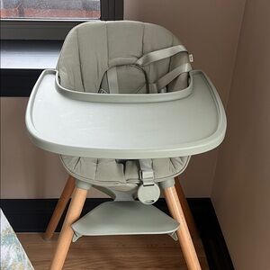 Lalo High Chair in sage green never used like new with cushion included